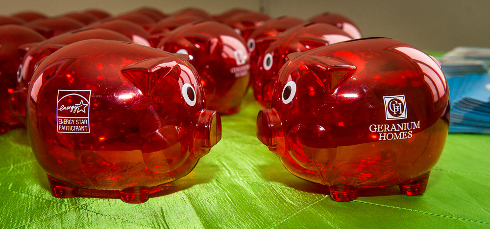 Piggy Banks celebrating Geranium Homes Energy Star Event at Sally Creek Woodstock.